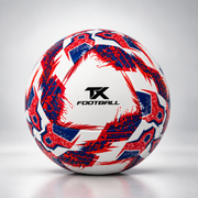Soccer ball with a red and blue abstract pattern and a black TX FOOTBALL logo in the center, photographed on a light gray studio background.